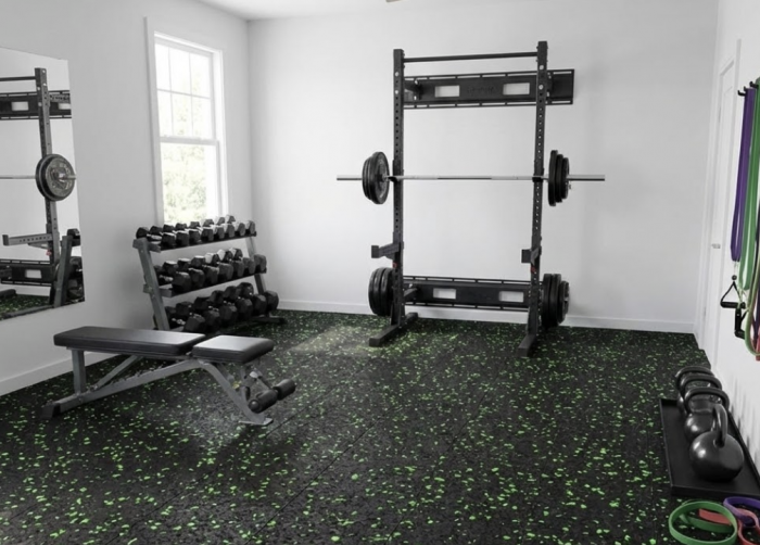 Home gym set up with a rack and dumbbells