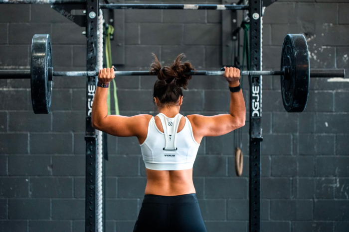 Woman performing shoulder press