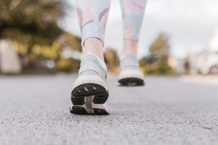 Woman running on the road