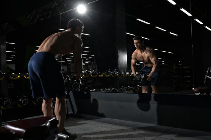 Man in mirror gym