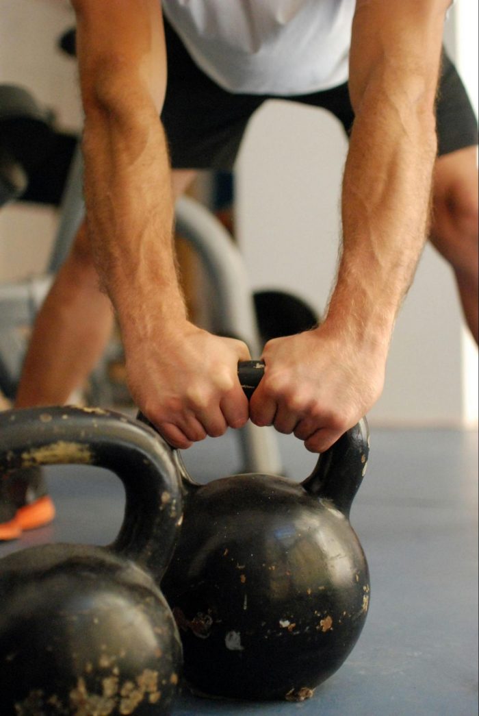 Man holding a kettlebell