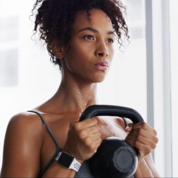 Woman holding a kettlebell