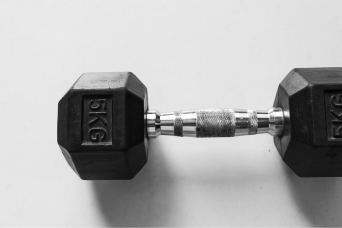 Rubber dumbbell on a white background