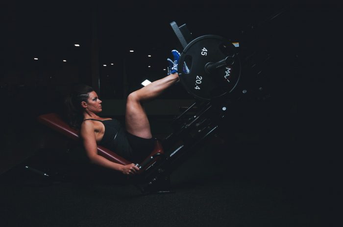 Woman performing a leg press
